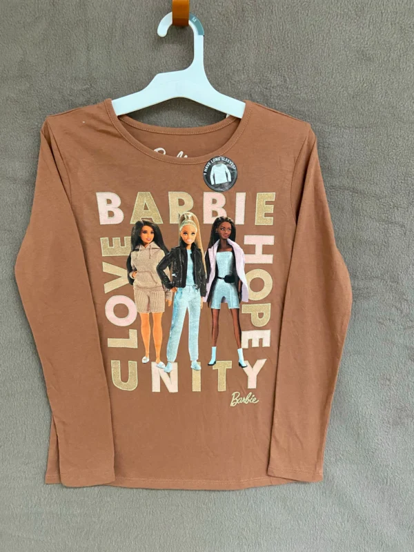 A brown long sleeve shirt with three women on it.